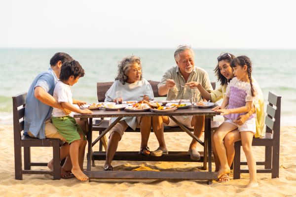 Retired couple with no financial worries enjoying time with their family.