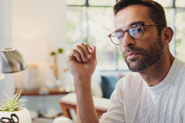 An Australian man is investing by consulting his financial advisor