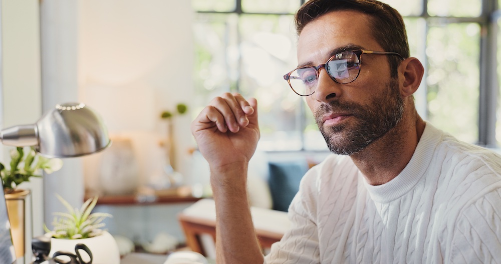 An Australian man is investing by consulting his financial advisor